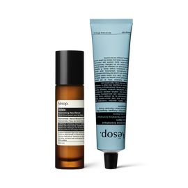 A pump bottle of Solais Replenishing Hand Serum and a tube of Reverence Aromatique Hand Balm together