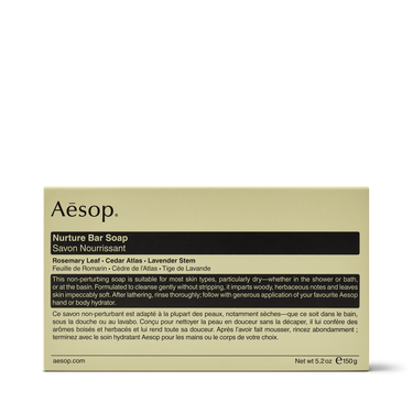 Aesop Nurture Bar Soap in pale yellow-green rectangular packaging with black printed text on a white background.